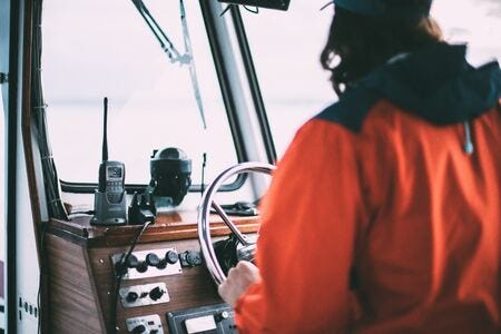 Person navigating on boat